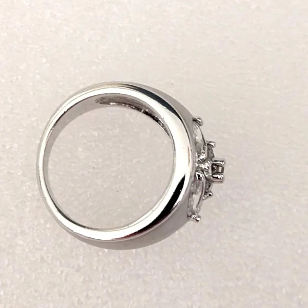 Matte brushed silver tone and faux diamond wide band ring